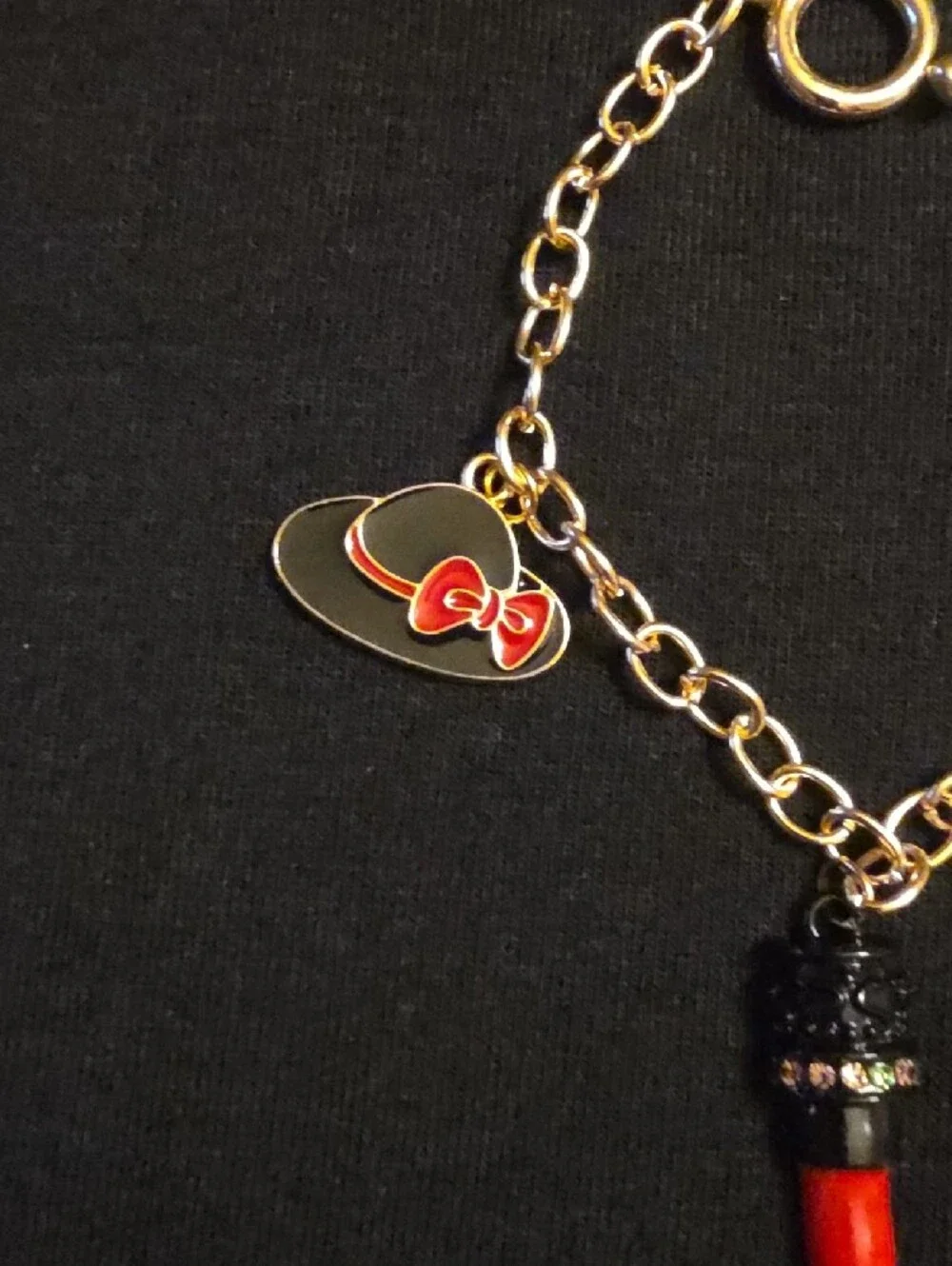 Gold-Tone Charm Bracelet with Red Enamel Accents